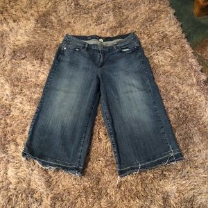 Lane Bryant Capri jeans with tattered hemline.